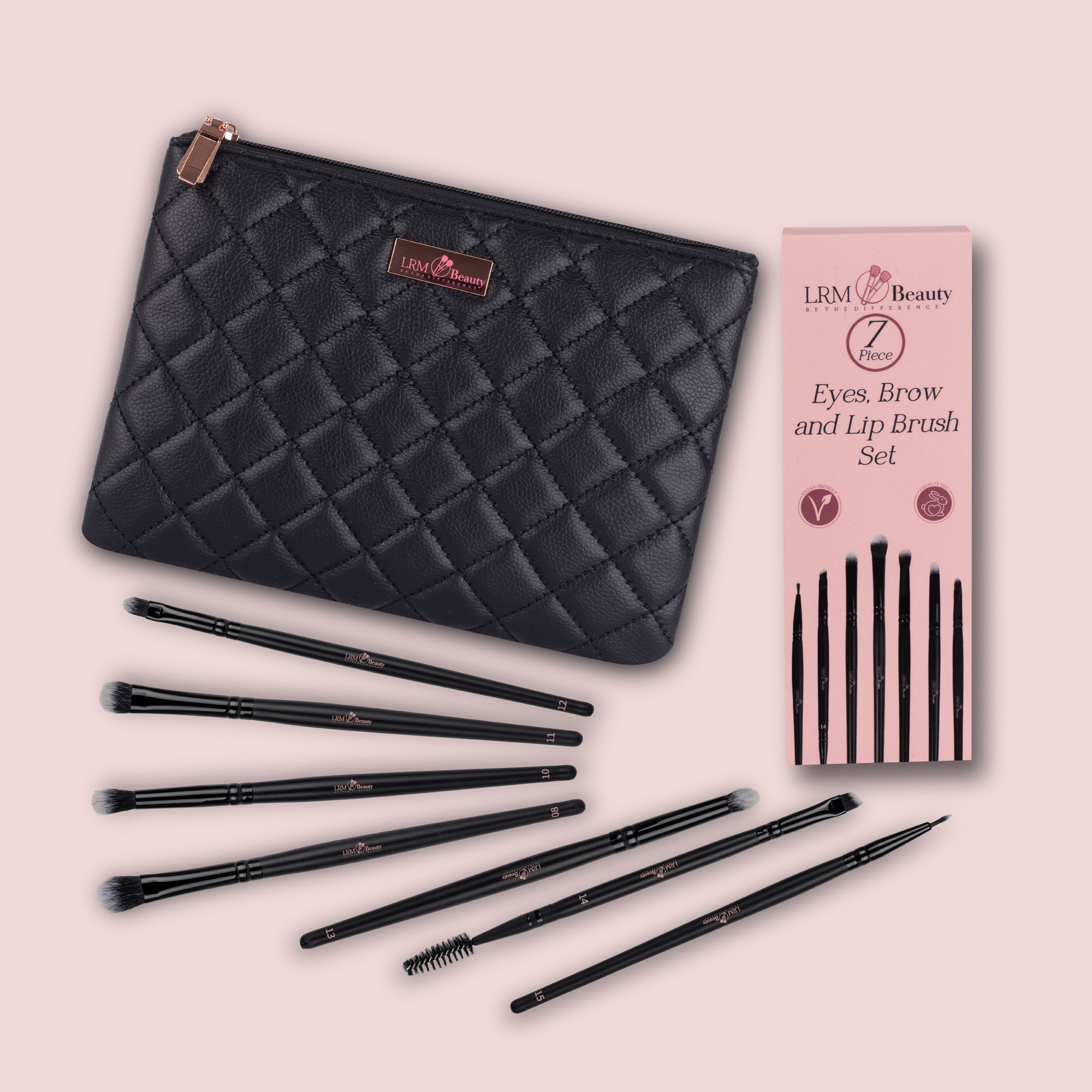 7-piece eye, brow, and lip makeup brush set with a premium makeup bag and packaging on a pink background