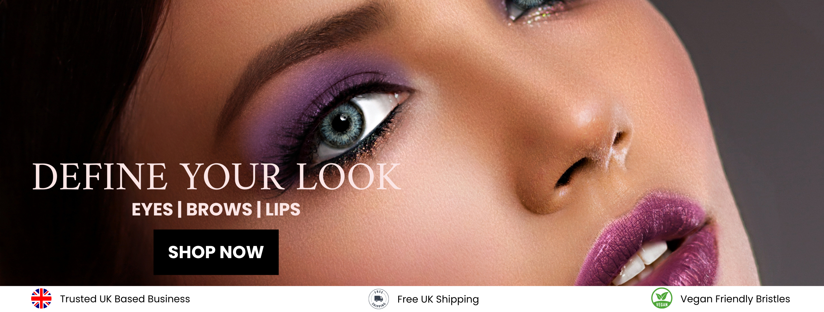Female posing with purple lipstick and eyeshadow